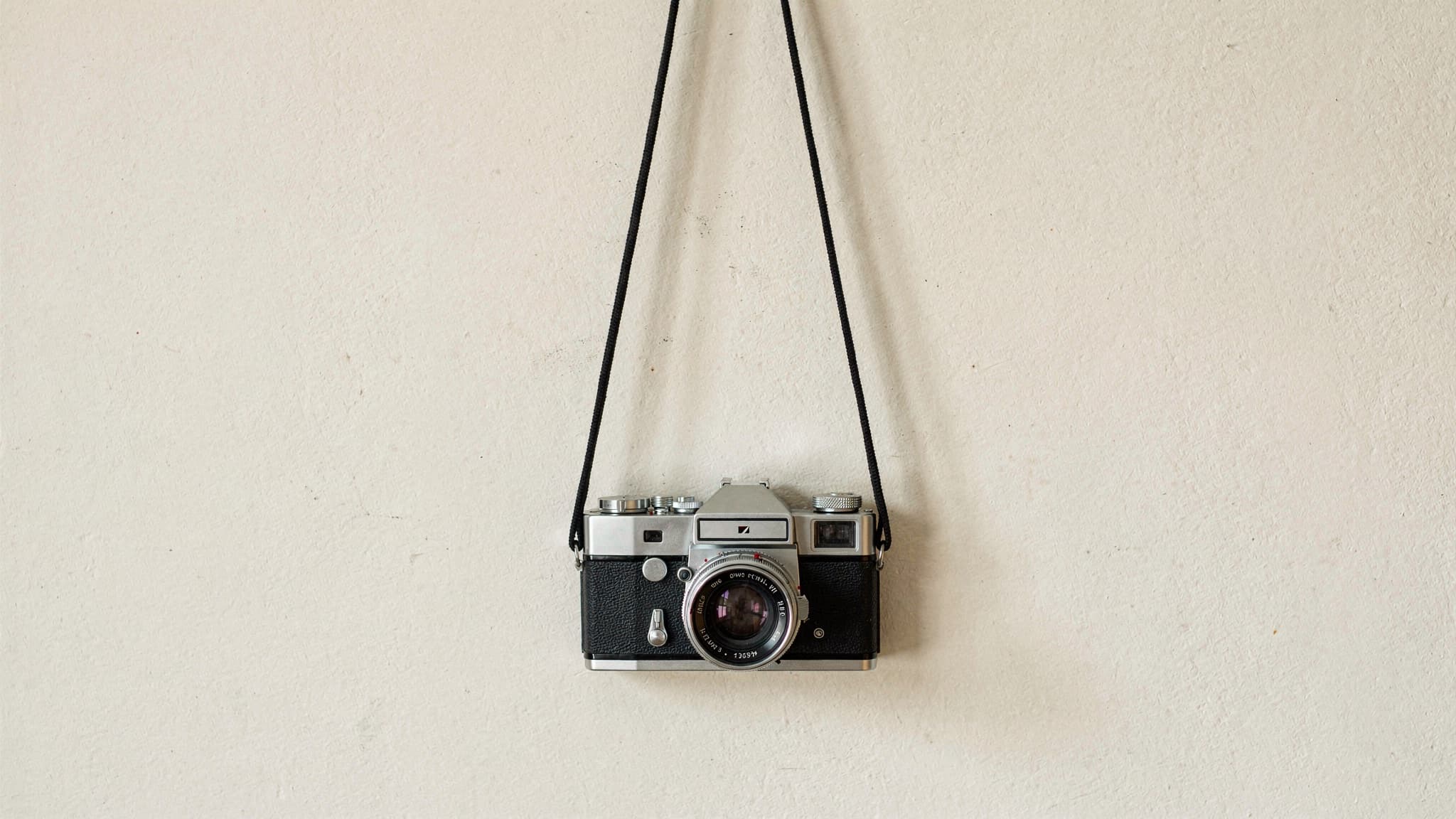 Vintage camera hanging on a wall